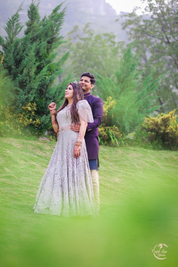 Aparna & Arnav's Couple Portrait Picture in JW Marriott Mussoorie Lawn amidst Beautiful Mountain Landscape