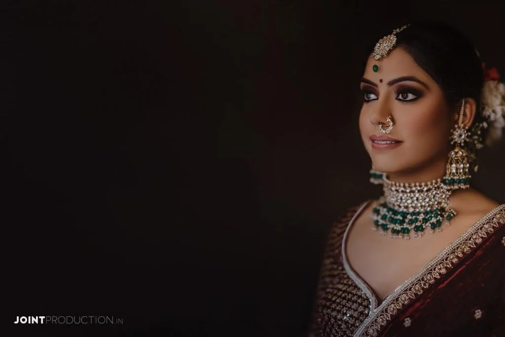 2020 Bridal Bold black kohl’ed and maroon smokey cat eye clicked by Joint Productions
