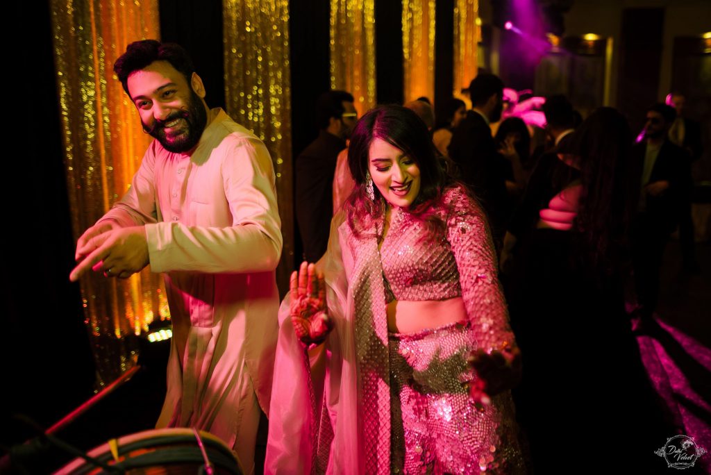 Dancing portrait picture of Nikita & Puneet at the cocktail ceremony of their Beach Wedding in Pattaya