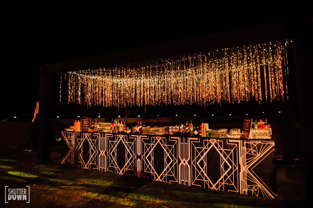 Gold Bling theme bar decor for cocktail ceremony of Mrighna & Shallabh