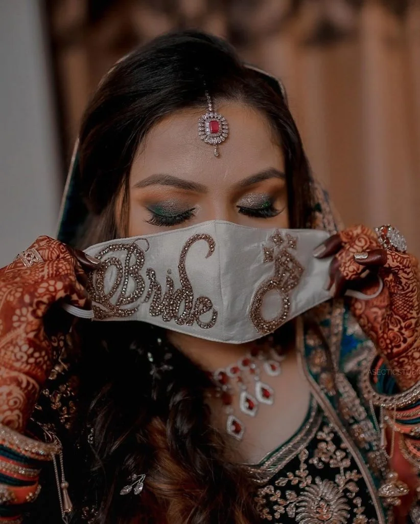 white face masks with bride text and diamond ring