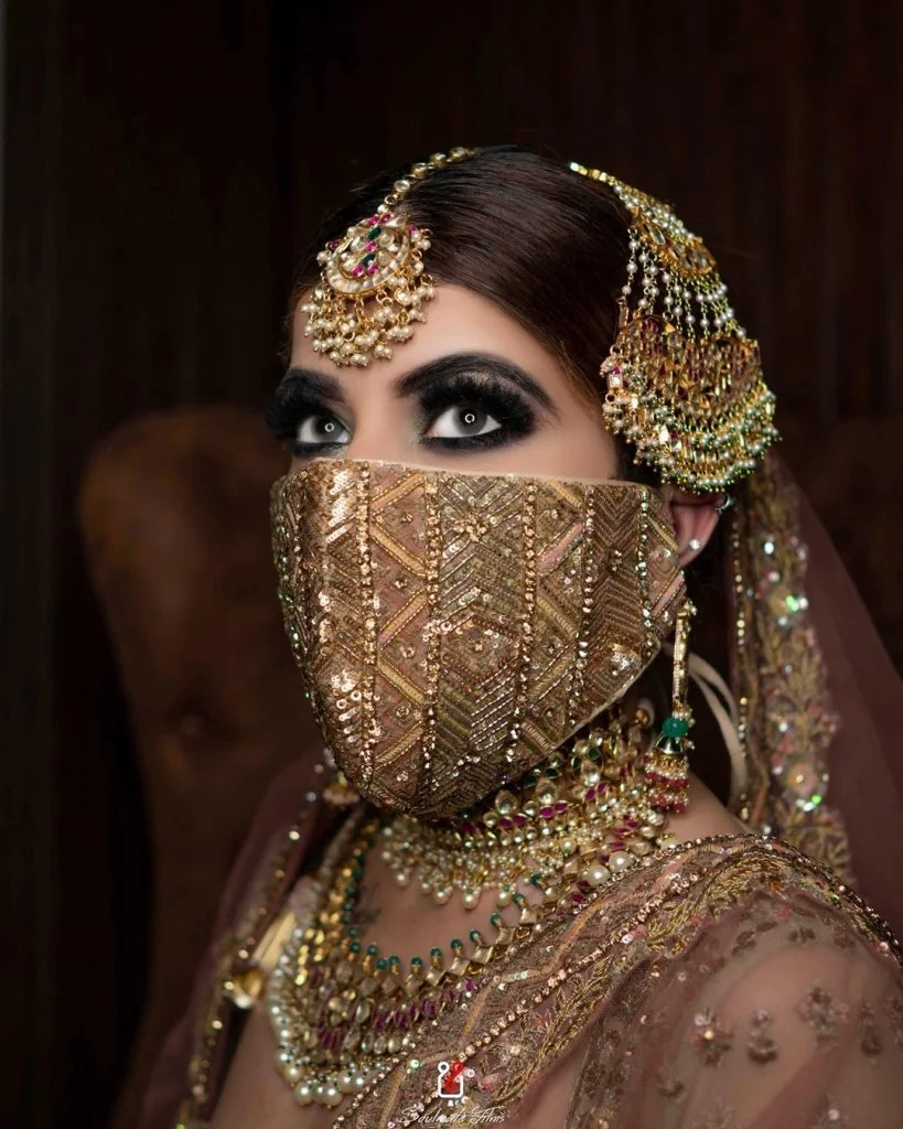 Jeweled and sequined heavy golden bridal face masks for Indian brides