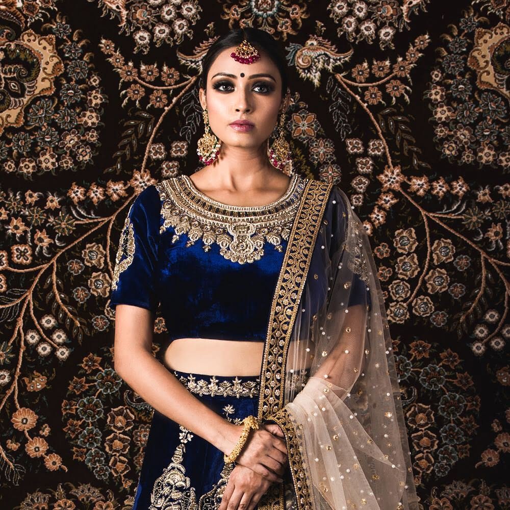 Navy blue velvet lehenga blouse with zardozi work. 