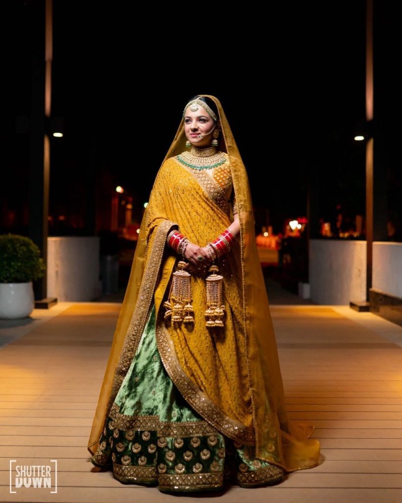 Mrighna's Solo Bridal Portrait in Gold Sabyasachi Bridal Attire for Her Beach Wedding in Dubai