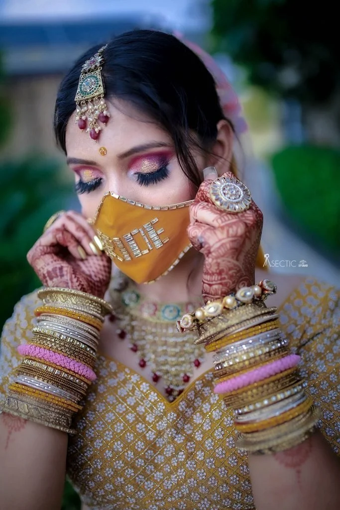 face masks for Indian wedding with sequin text saying bride