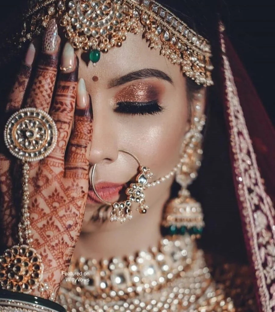 Priya Chopra's copper glitter bridal eye makeup