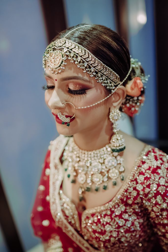 bold glitter bridal eye makeup with winged liner