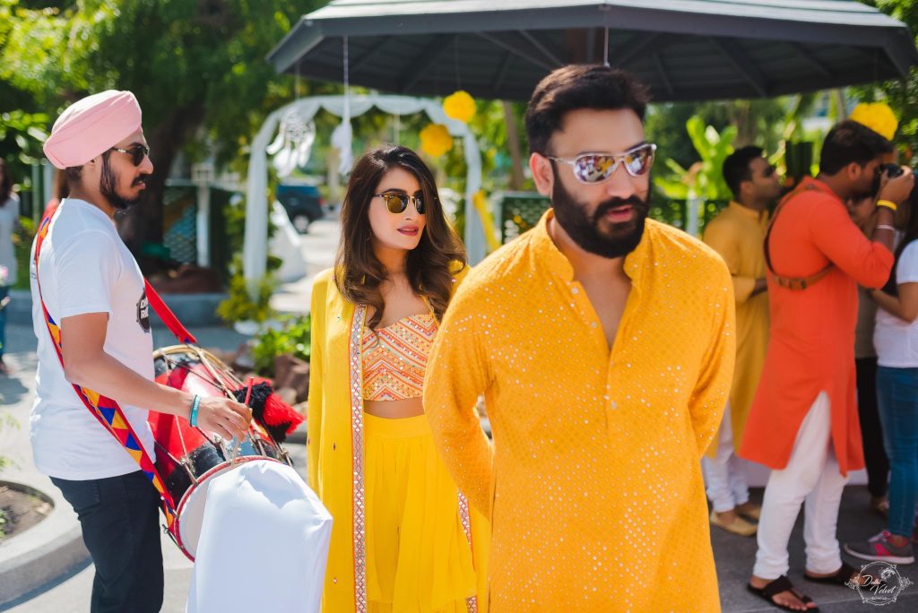 couple matching haldi ceremony outfit for poolside event in pattaya
