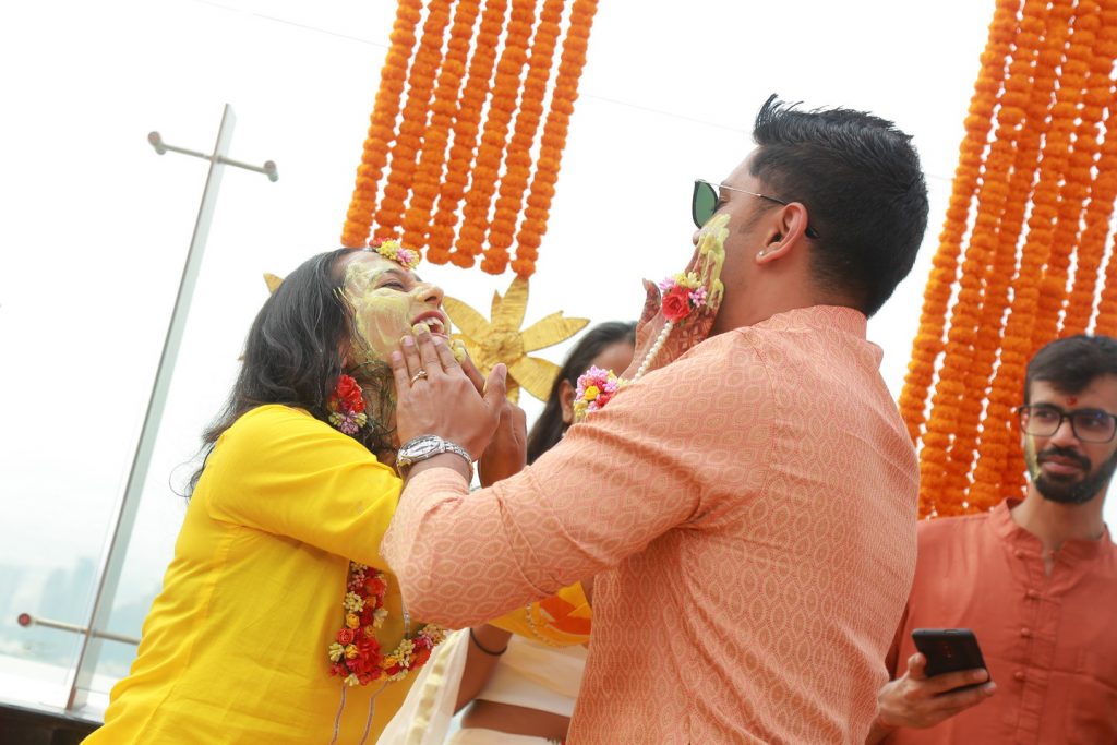 candid picture of fun haldi ceremony event