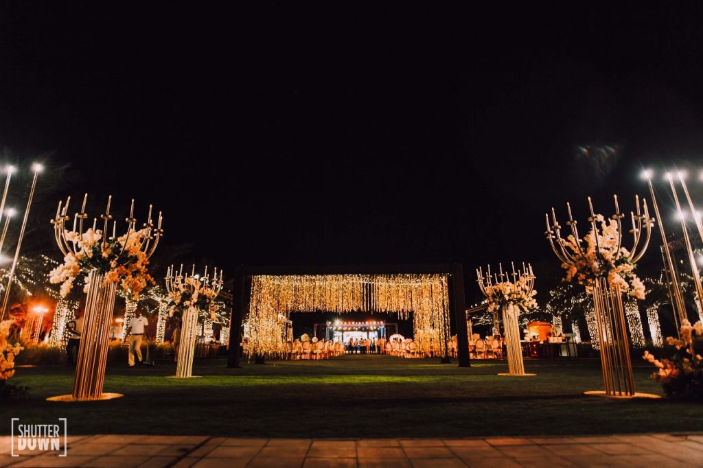 outdoor destination engagement floral decoration with hanging lights in Intercontinental Fujairah Resort