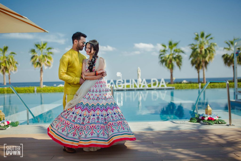 adorable couple poolside photoshoot for moroccan themed mehendi