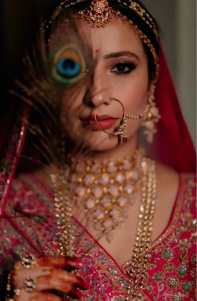 Shika Chandra's rosy pink bridal eye makeup and cat eyeliner