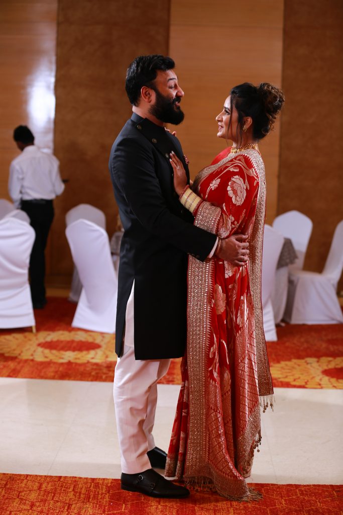 Nikita & Puneet in their beach wedding reception outfits