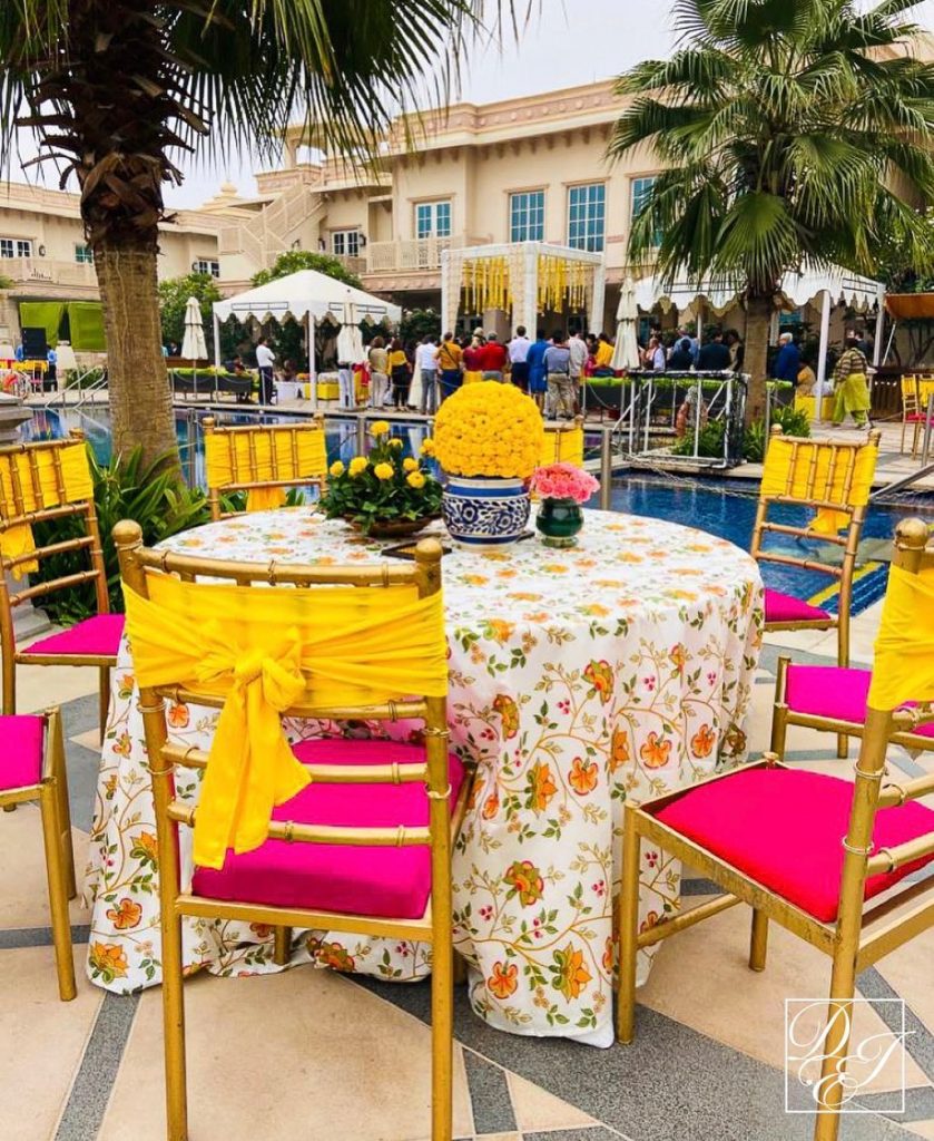 bright yellow and pink chair decoration and accessories for wedding