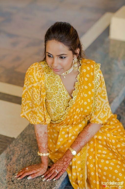 Indian Bride Shalini looking mesmerising in her designer yellow saree and traditions jewellery for her Dusit Thani Hua Hin Wedding's Mayra Function