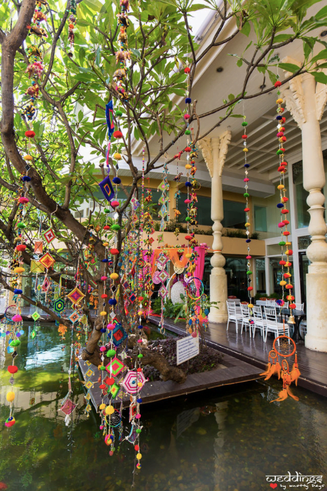 Indian Mehendi function with beautiful colourful hangings for this Dusit Thani Hua Hin Wedding