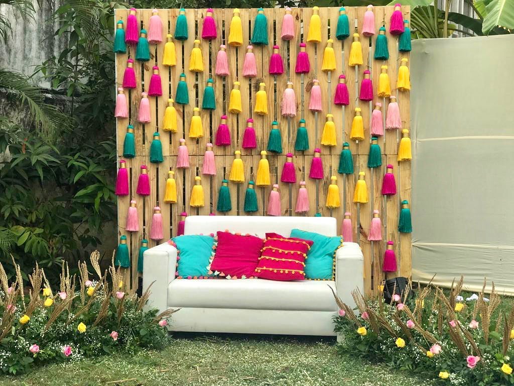 colorful tassel home decor for outdoor seating arrangement