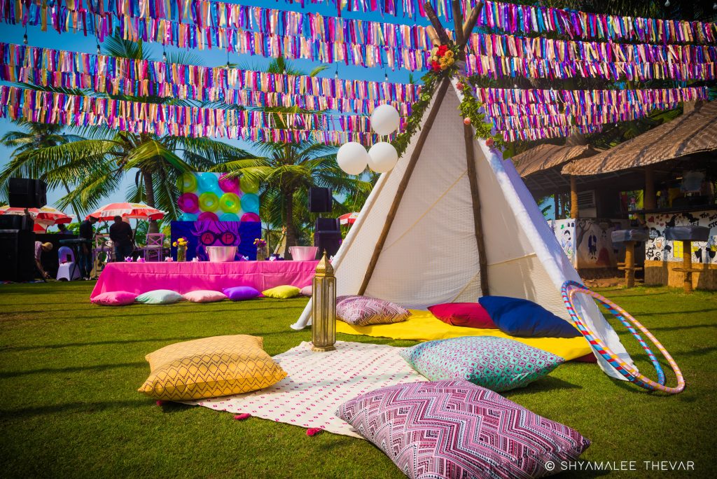 vibrant white canopy guest tent with pillows