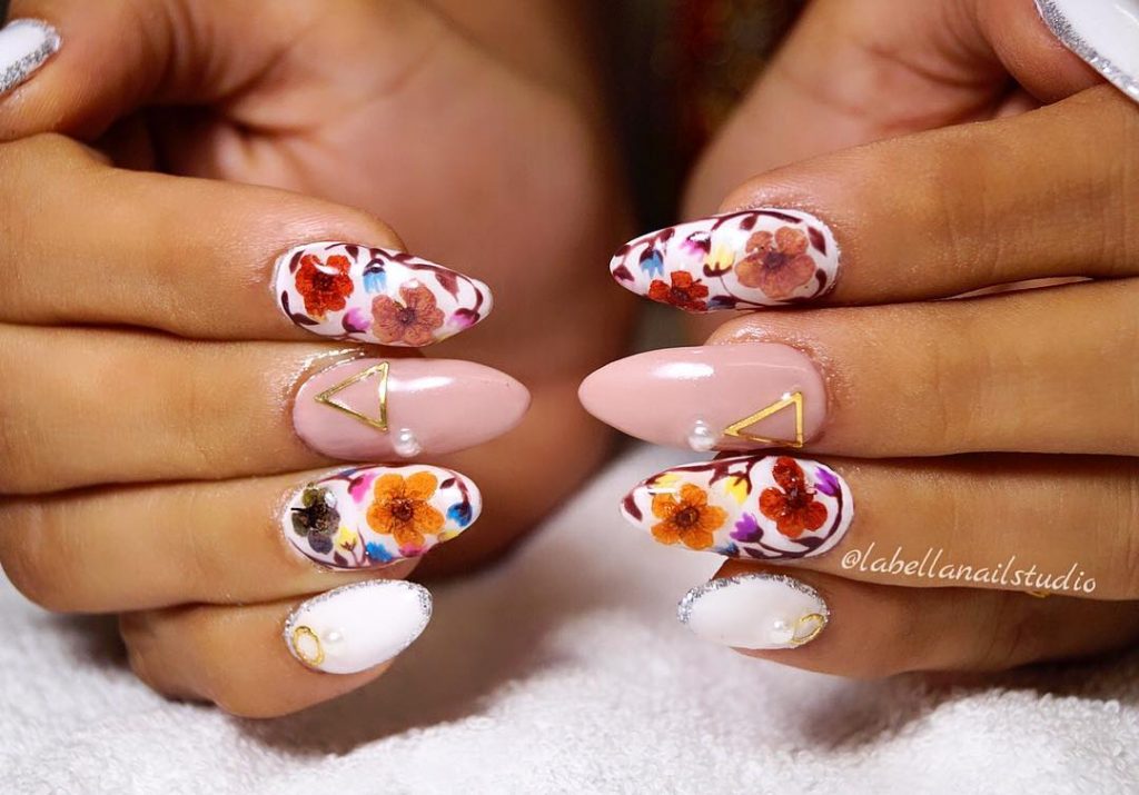 offbeat multicoloured floral pint long bridal nail art