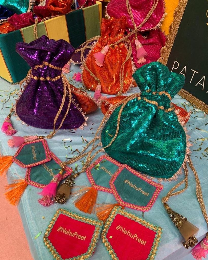 sequin sachet and embroidered cloth tassel wedding gifts and favors