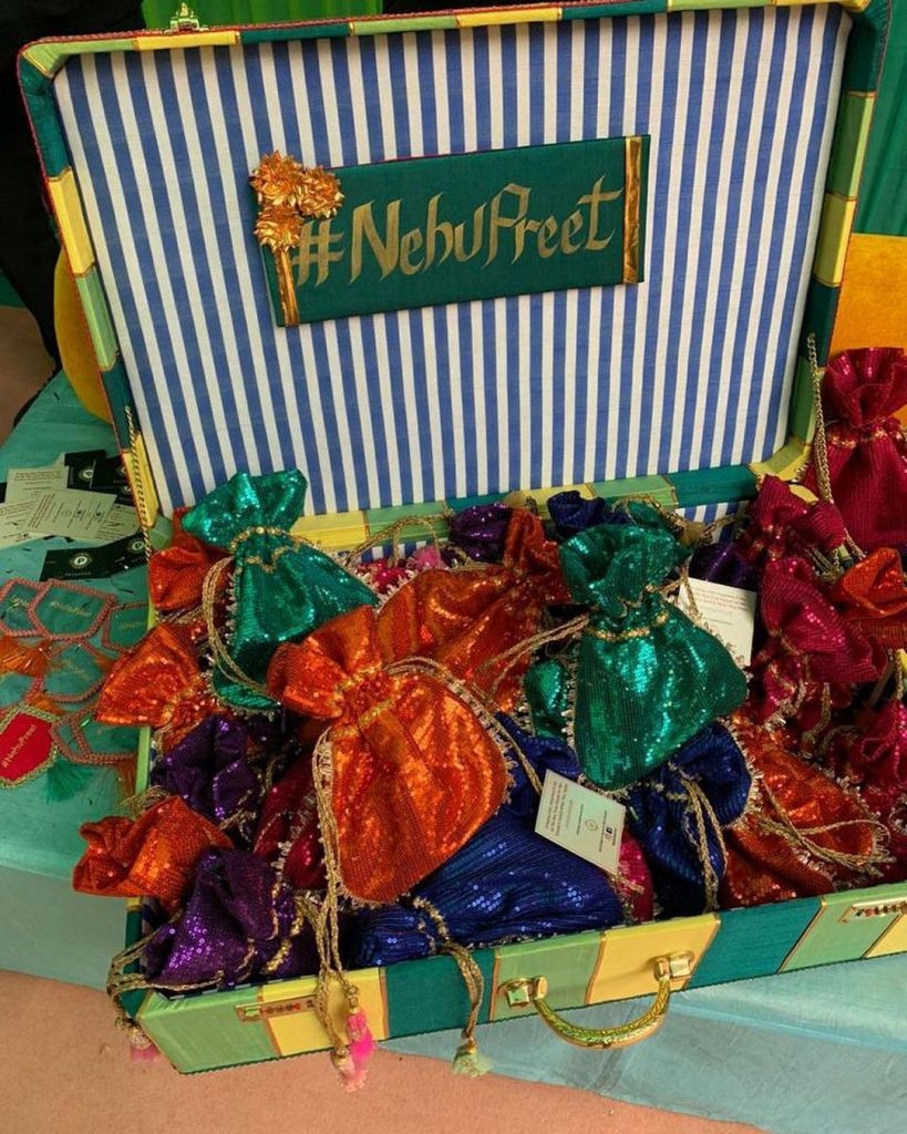 sequin wedding mehendi gifts in a trunk for nehupreet mehendi guests 