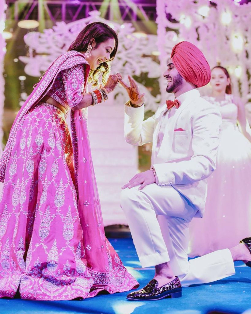 rohanpreet on his knees during ring ceremony with neha kakkar