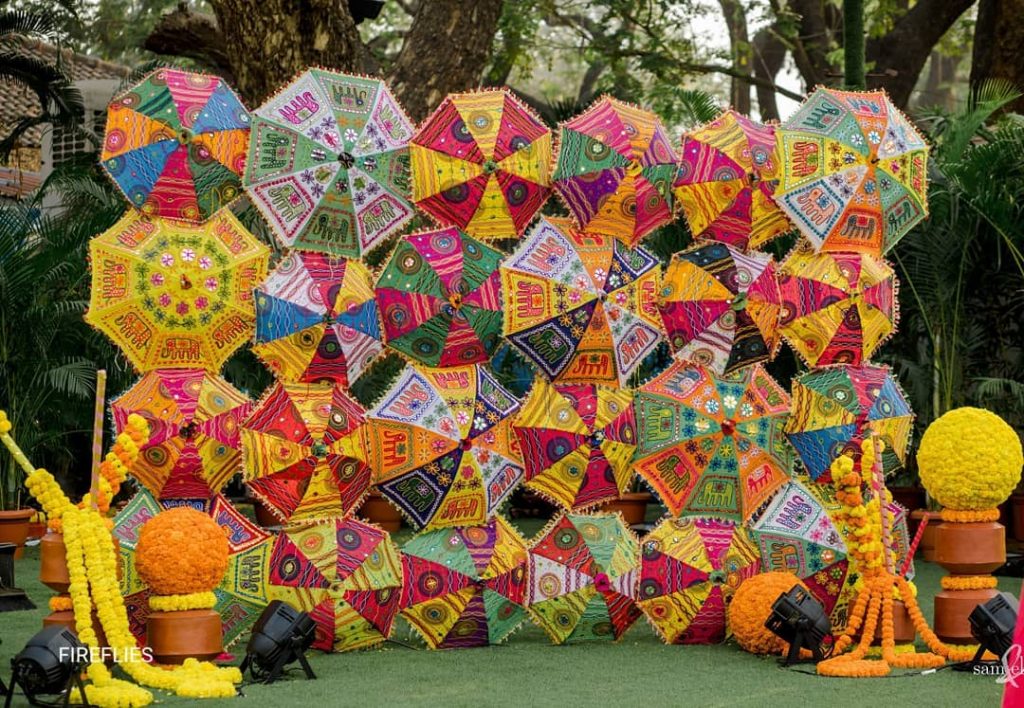 jaipuri umbrella wall backdrop for indian intimate home wedding