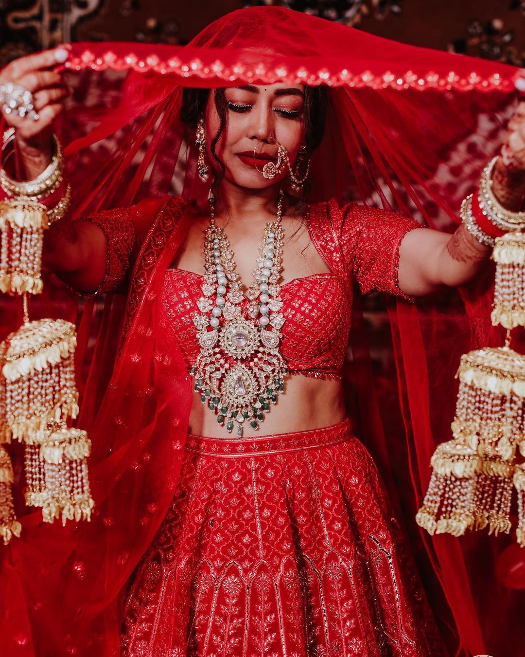 neha kakkar red dress pic