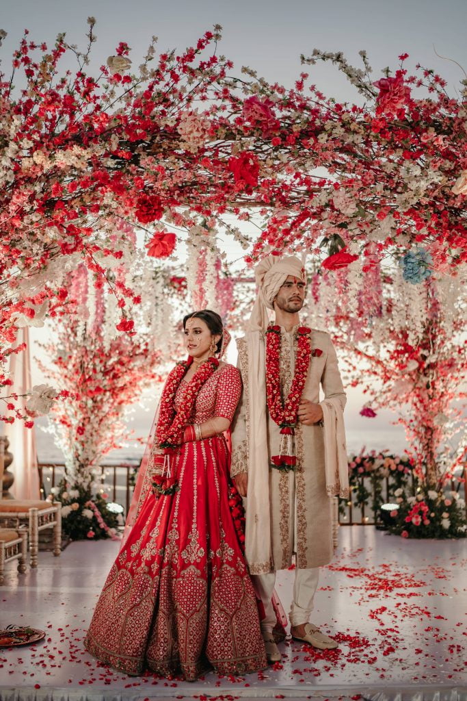 Beautiful Contemporary Mandap Decoration with Red, Pink & White Cherry Blossoms 