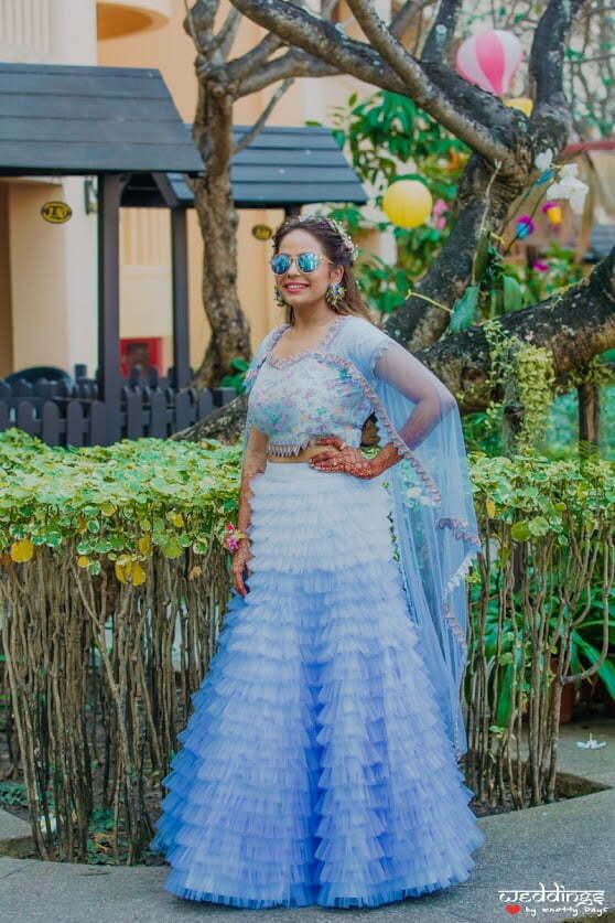 Shalini looking stunning in her aqua blue ruffled dress piece for her Hawaiian pool party at Hua Hin, Thailand