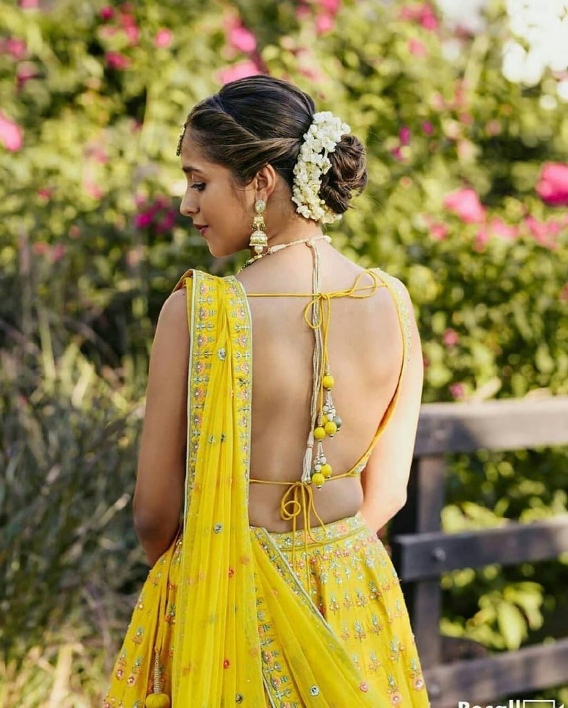 Yellow Dual Dori Backless Lehenga Blouse Back Design For Haldi Ceremony