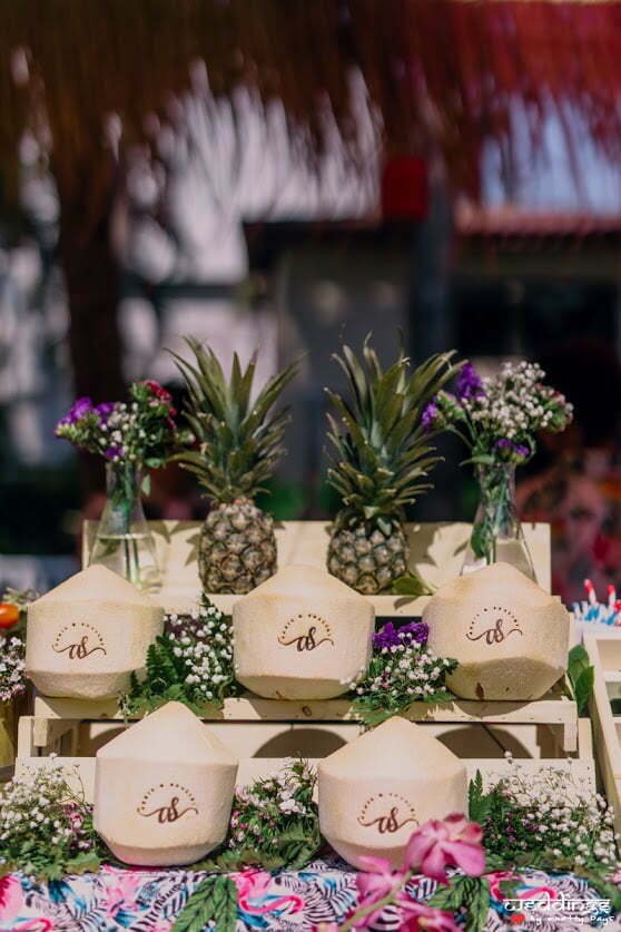 Customised logo stamped coconuts for this Dusit Thani Hua Hin Wedding's Pool Party 