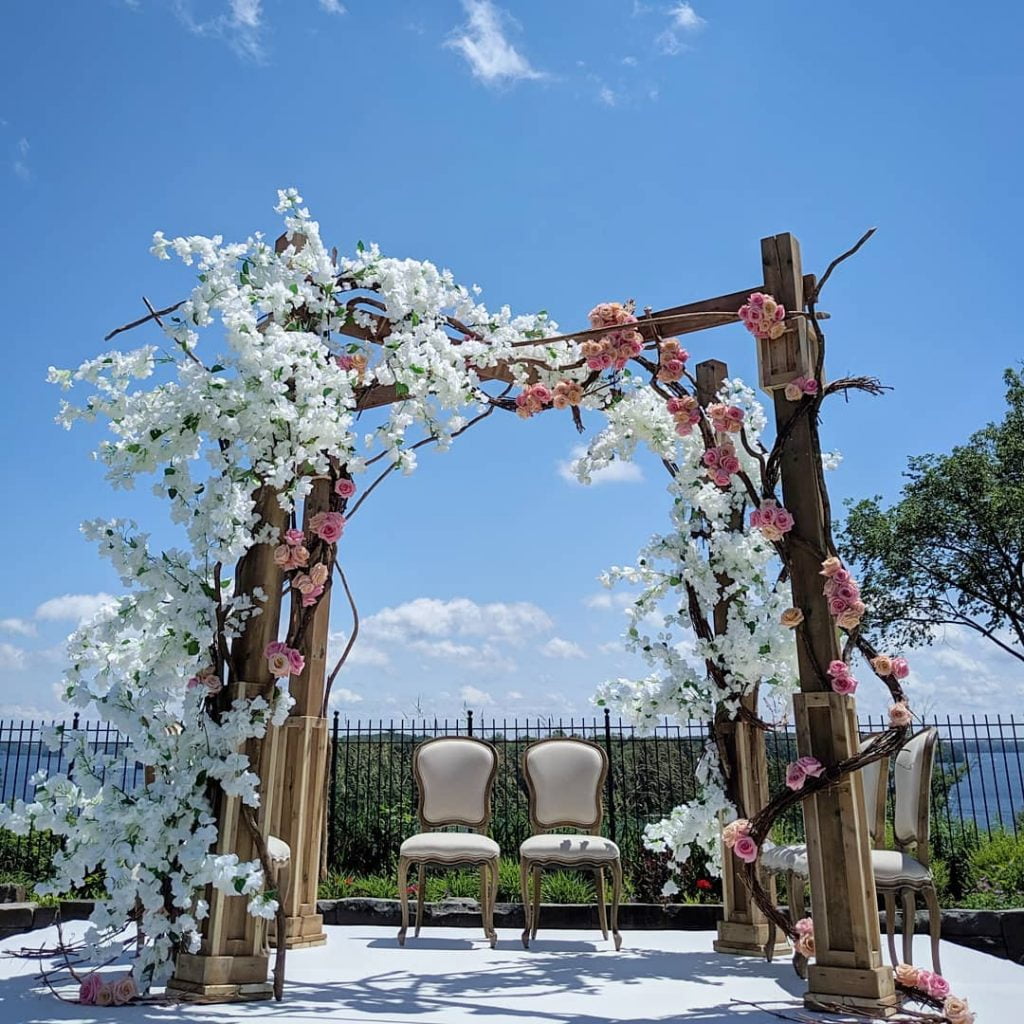 outdoor garden mandap decor with white and pink flowers