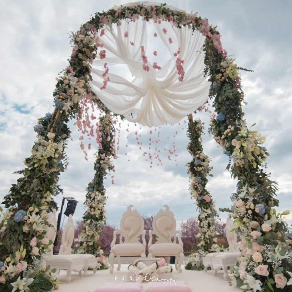 outdoor round ceiling open mandap with flowers