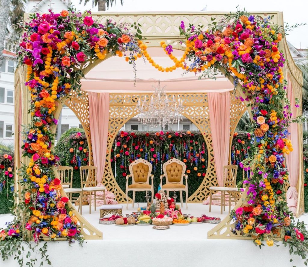 simple mandap decoration with colourful flowers