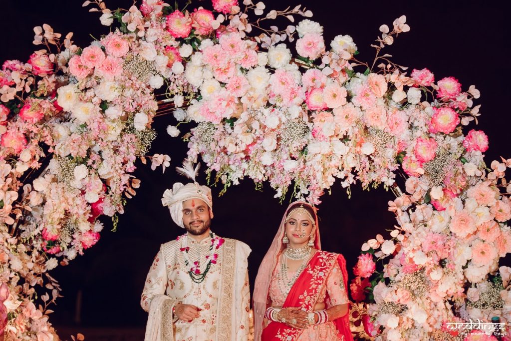 Post Wedding Photography of Akhil and Shalini with beautiful floral backdrop at their Dusit Thani Hua Hin Wedding in Thailand