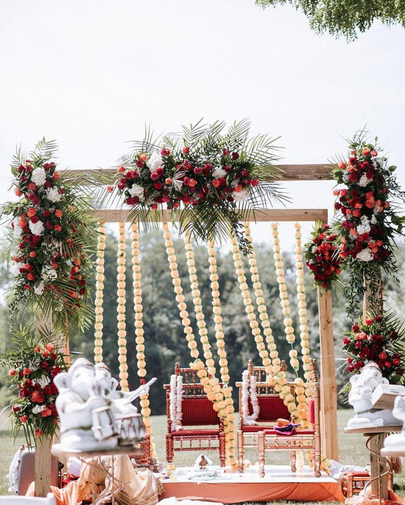 simple peach and maroon outdoor mandap