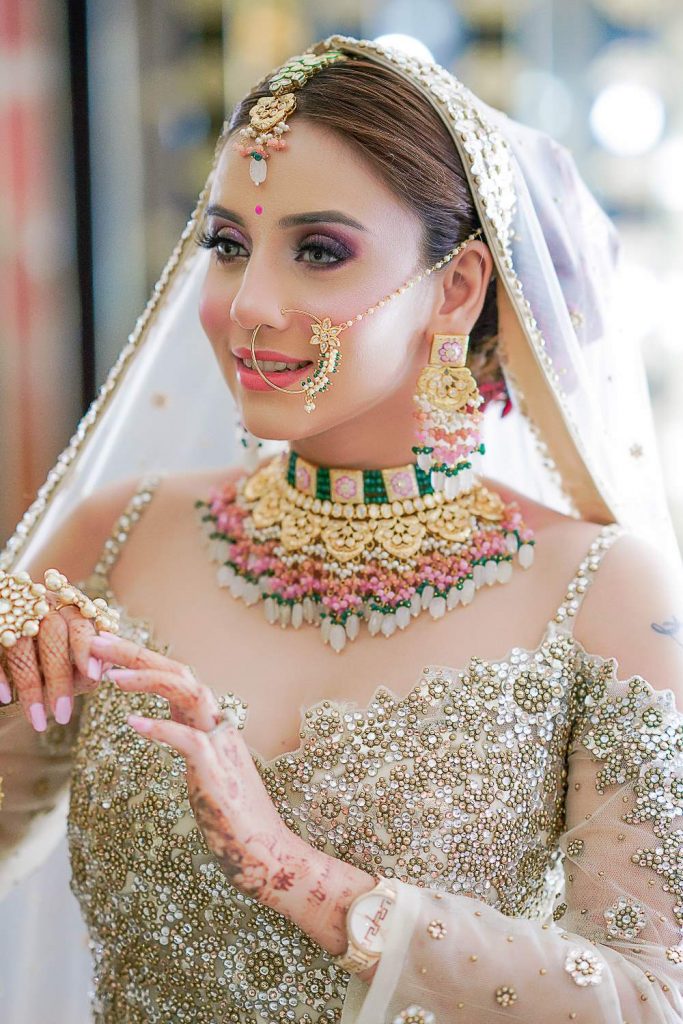 multi-colored jewellery with golden lehenga