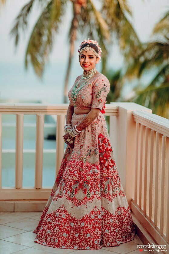 Intricately beautiful designer bridal lehenga adorned by Shalini at her Dusit Thani Hua Hin Wedding in Thailand