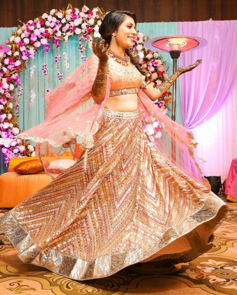 glitter pink mehendi ceremony dress code lehenga