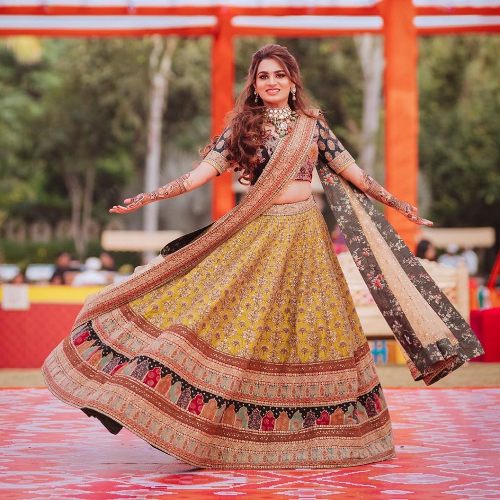 yellow blue embroidered sabyasachi mehendi lehenga for bride