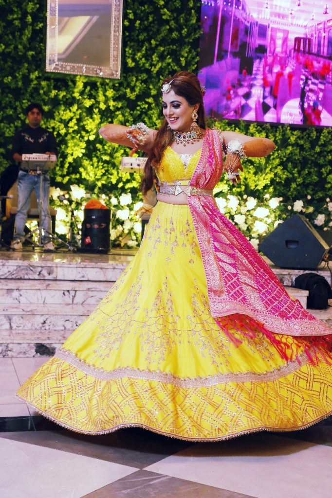 yellow lehenga with pink chunni designer mehendi outfits for bride