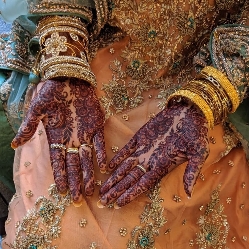 Elaborate Arabic Bridal Mehndi Design for Front Hand