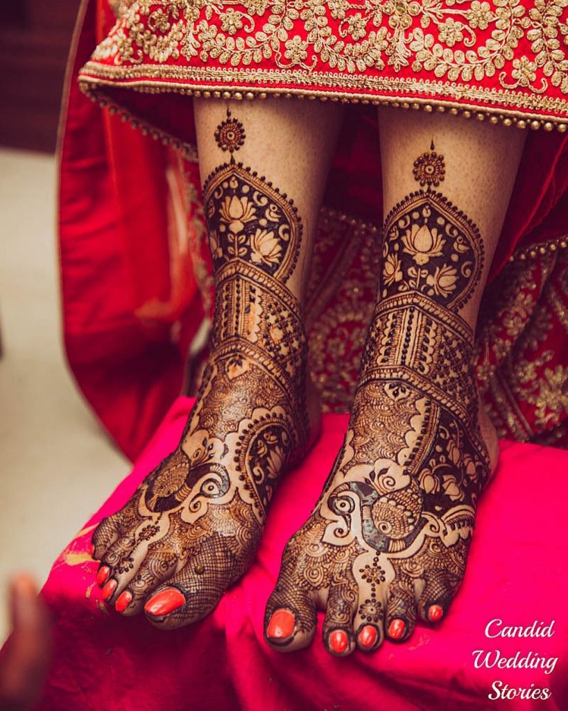 Layered peacock motif feet bridal mehndi design