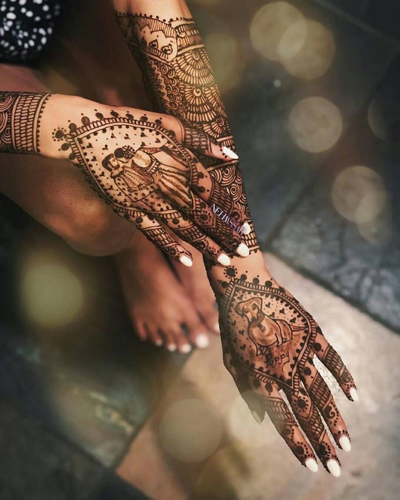 Personalized bridal mehndi design with portraits