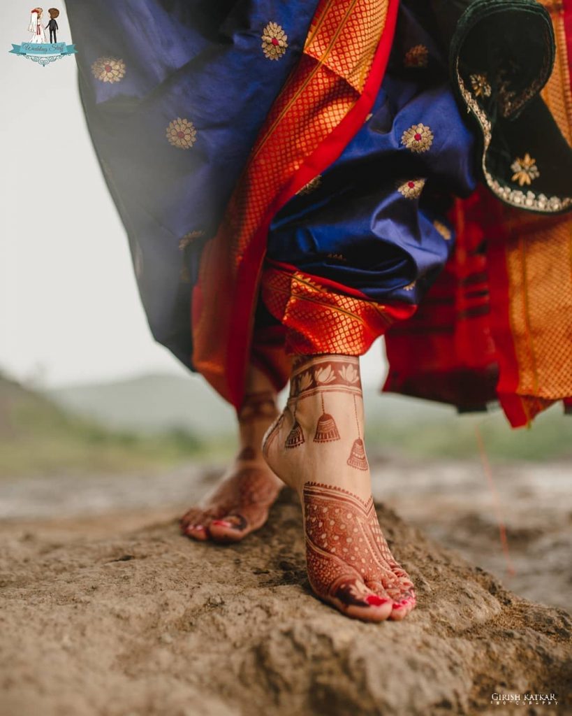 Lotus and Bell Motif Feet Mehandi Design