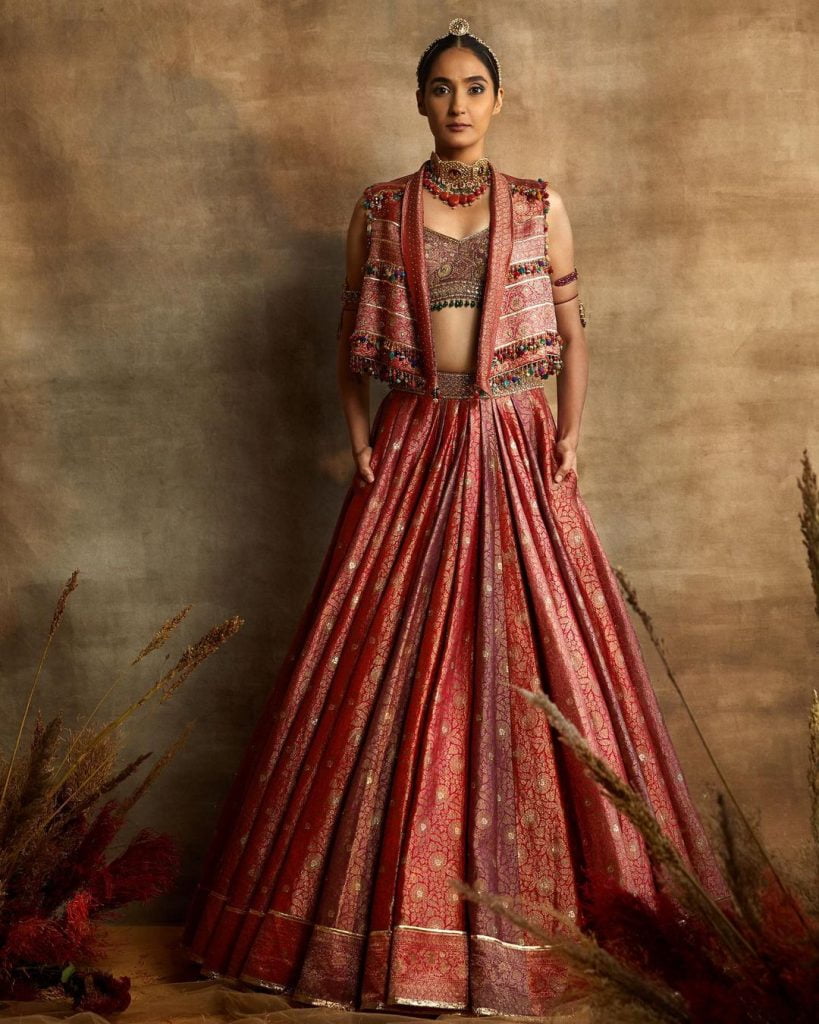 open front wide collared peach brocade jacket style lehenga