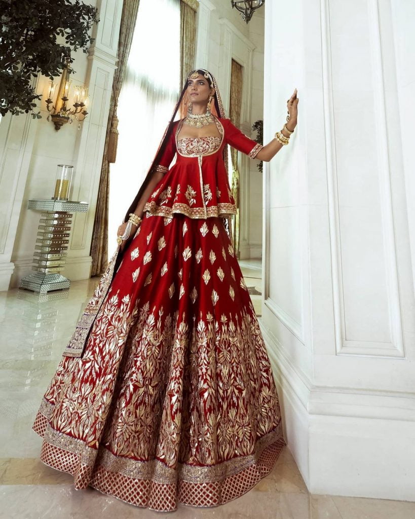 red lehenga with jacket style choli