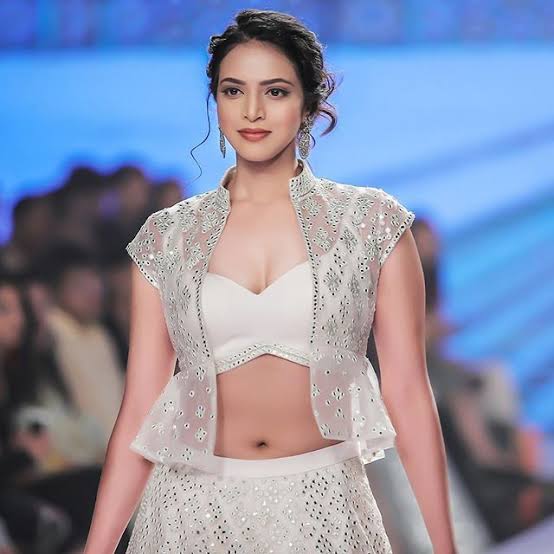 Seine Stone Georgette Short Jacket with Periwinkle Blue Velvet Bustier and  Lehenga