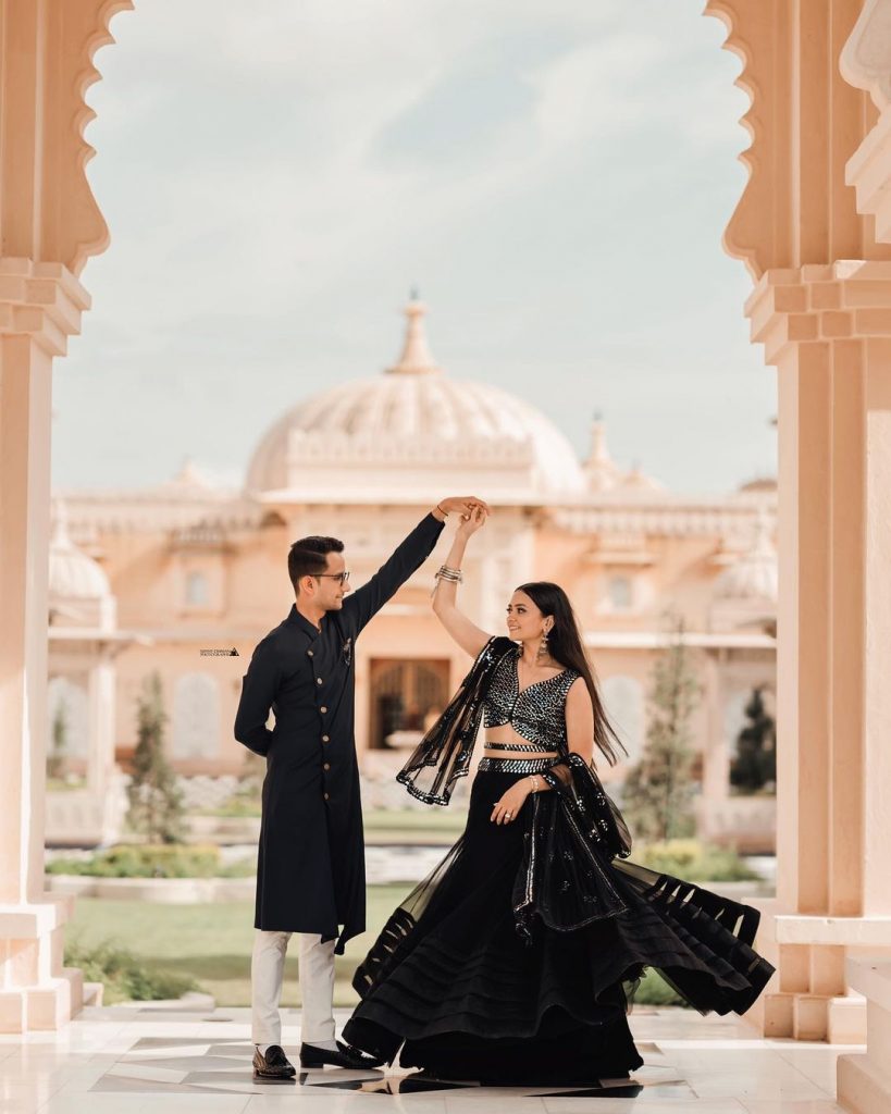 cute couple pose for pre wedding shoot